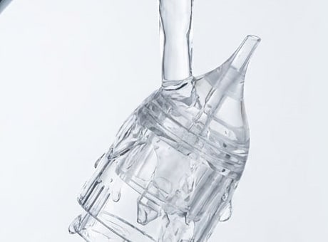 Tip of the Securidou electric nasal aspirator rinsed under the tap