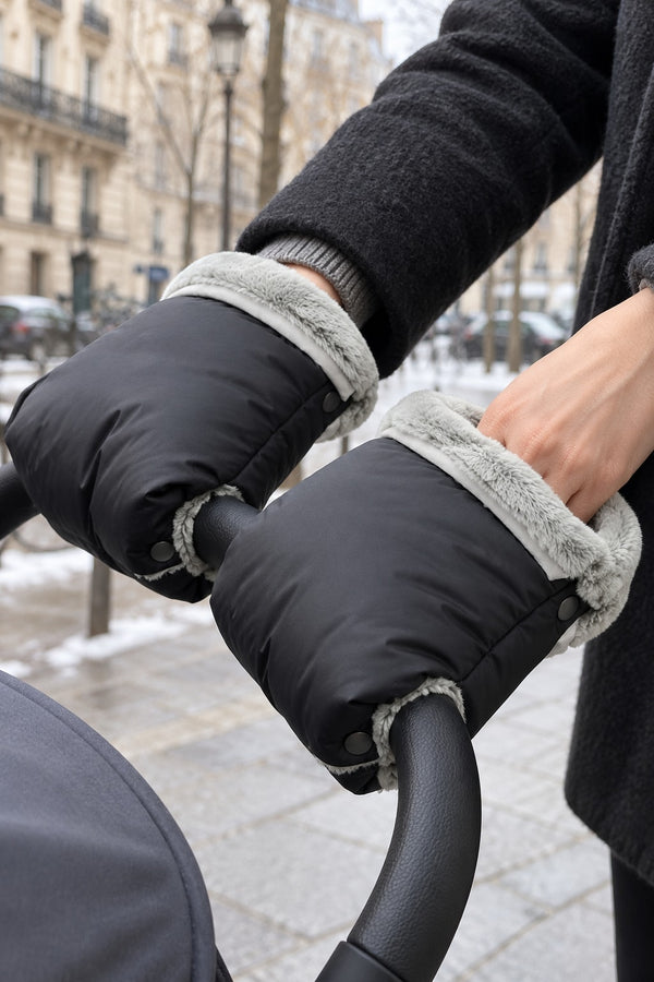A parent’s hand slipped into the plush lining of a Securidou stroller mitten