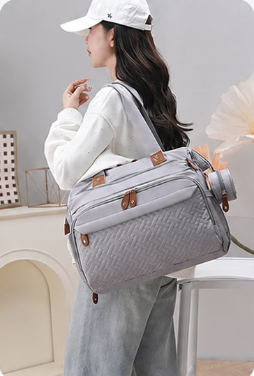 Securidou diaper bag worn over the shoulder