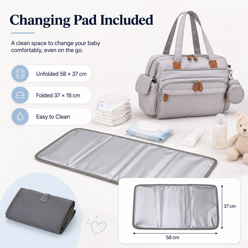 Changing Pad Included A clean space to change your baby