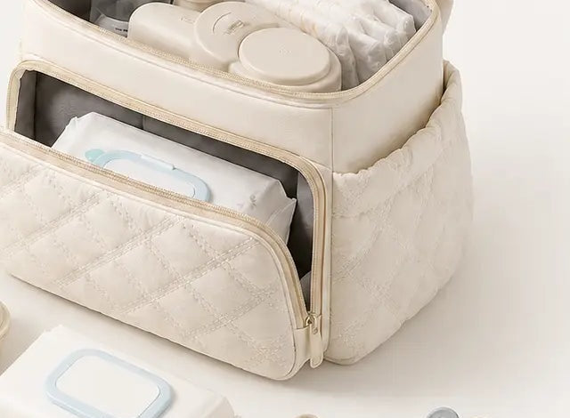 The two compartments of the Securidou insulated bottle bag, open