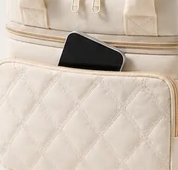 Phone slipped into the front pocket of the Securidou insulated bottle bag