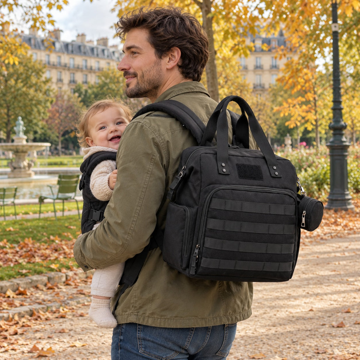 Dad walking with his baby in a carrier, black Securidou diaper bag on his back